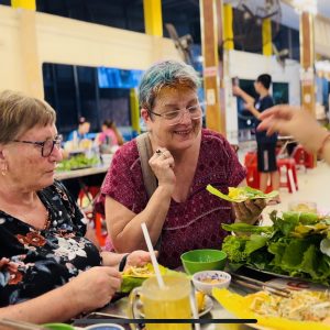 Guests are having Banh Xeo